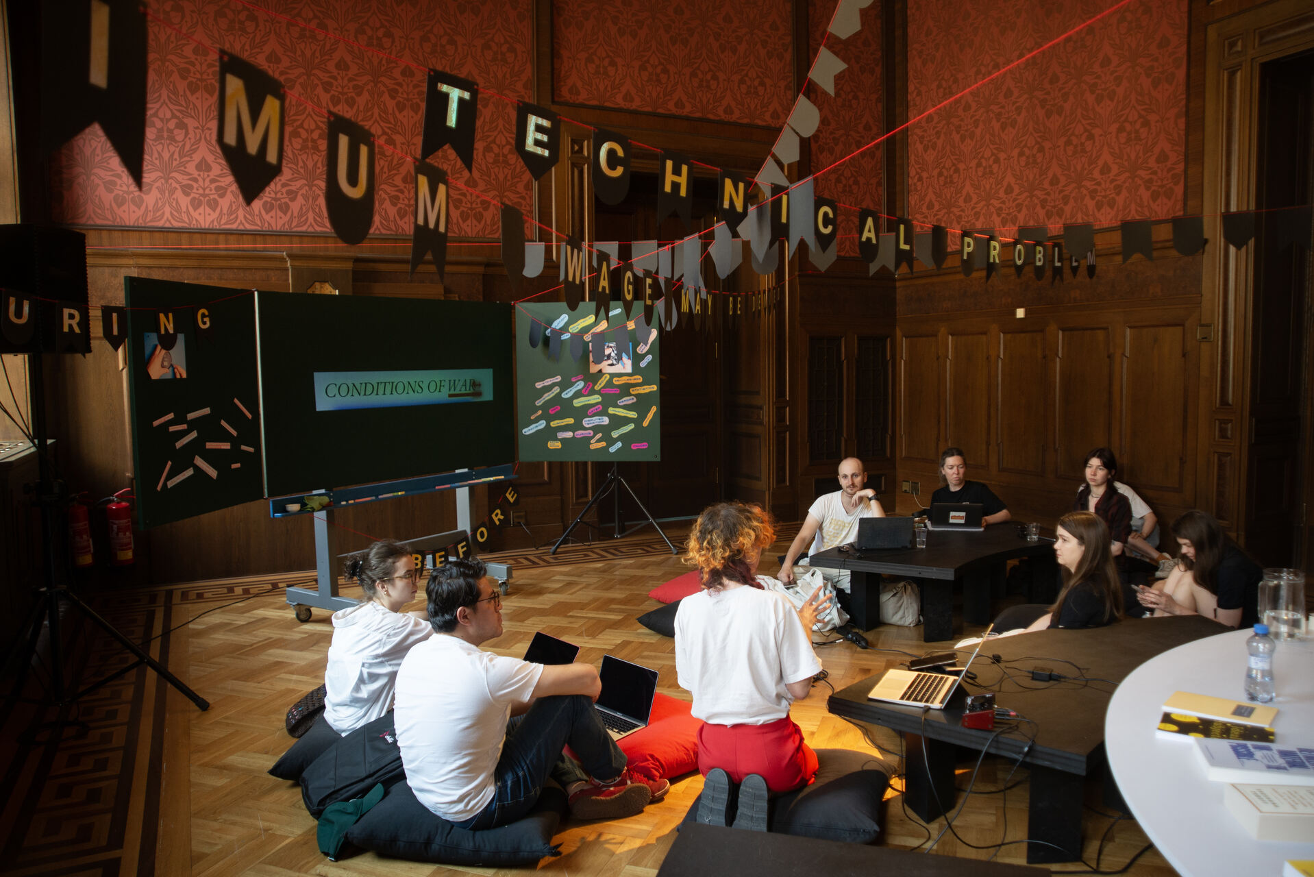 Reading session during “DATAS: The Data and the Sovereign” exhibition in Galerie Rudolfinum in Prague, 2026 / (c) GR, photo Tereza Kunderová